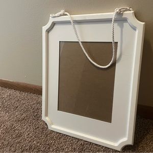 white hanging frame